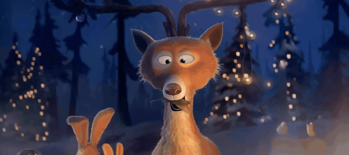 A gif from an animated ad for Intermarché of animals eating a holiday dinner together when a wolf shows up with a quiche