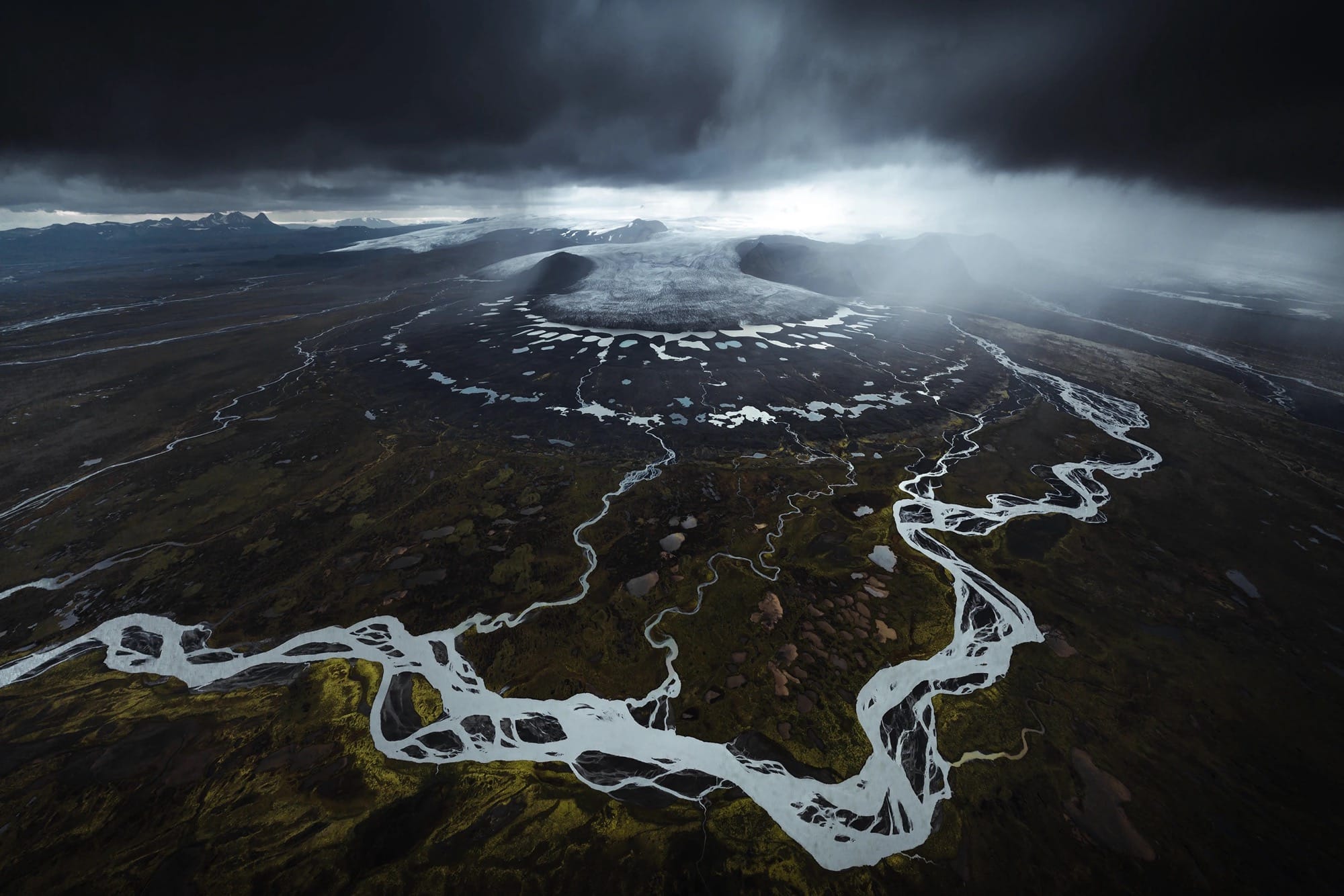 An aerial landscape of glacial streams in Iceland