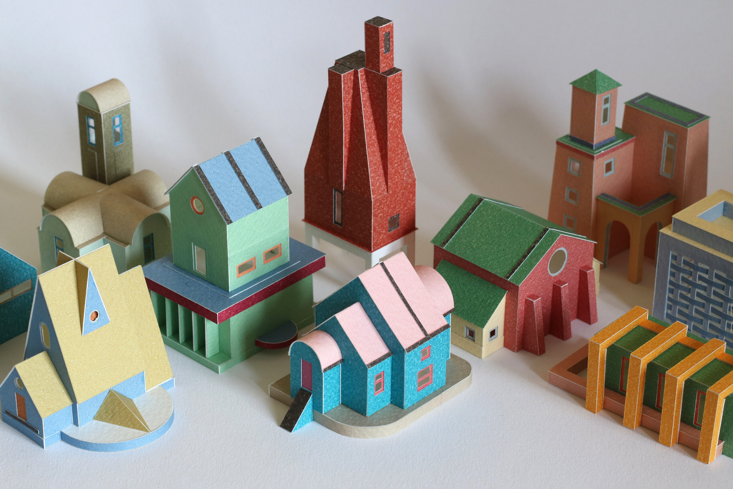 Colorful miniature paper models of buildings by Charles Young